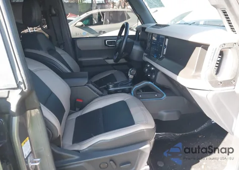 2023 Ford Bronco Wildtrak z USA, uszkodzony, nr VIN 1FMEE5DP4PLB39967